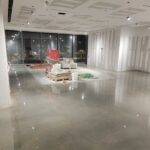 Polishing concrete floor in process